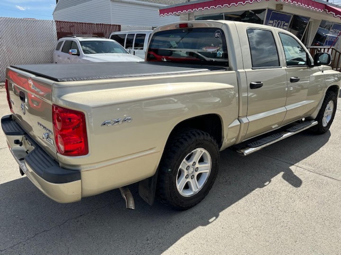 2011 /BEIGE Dodge Dakota SLT (1D7RW3GK3BS) with an 3.7 V6 engine, Automatic transmission, located at 3200 1st Avenue North, Billings, MT, 59101, (406) 245-9055, 45.779270, -108.510742 - Very Nice 4 Door Pickup with A Ton of Options! Power Windows, Power Door Locks, Remote Key Entry, Rugged Terrain Tires, Tilt Steering Column, Cruise Control, 4X4, Running Boards, Tonneau Cover, Towing, Custom Bumper Guard and Only 79,000 Miles. CarFax Dealer Auto Brokers of Montana/AA&A Auto Ren - Photo#3